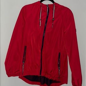 Red Tommy Hilfiger raincoat